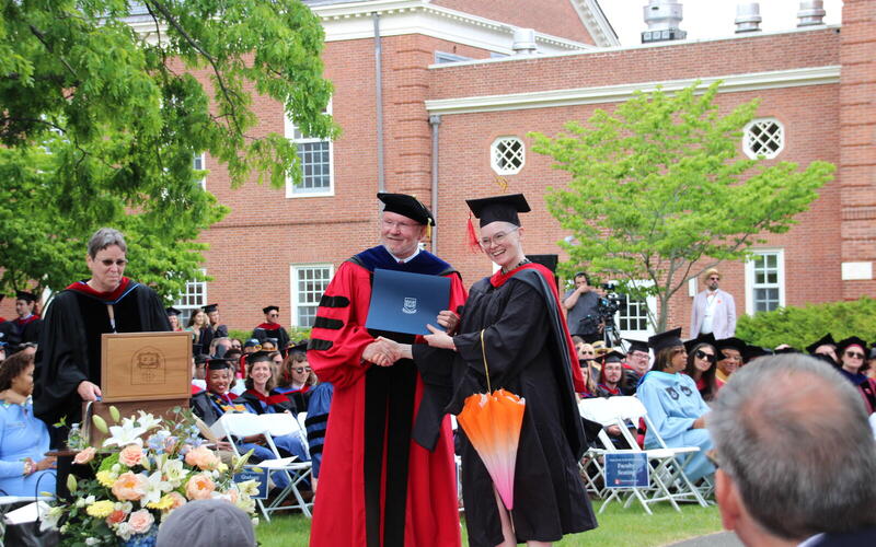 Graduate receiving an award