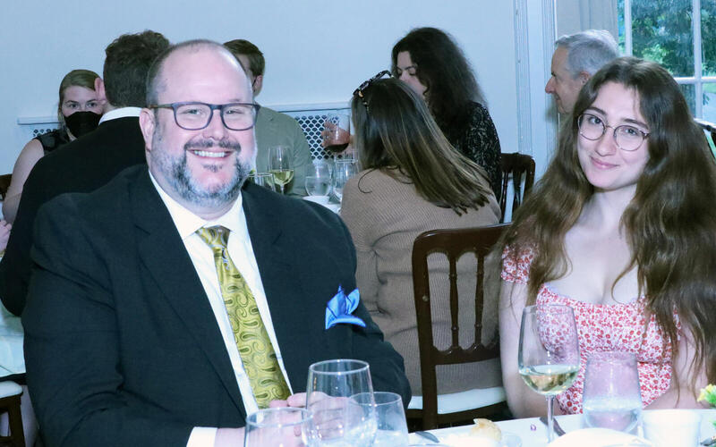 Graduates at table