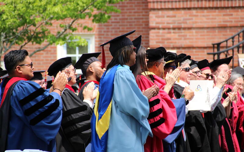 Graduates clapping