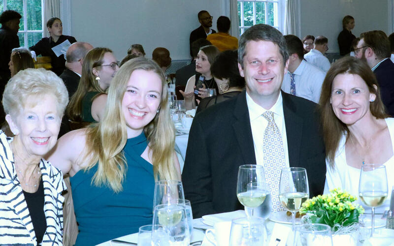 Graduate students around a table