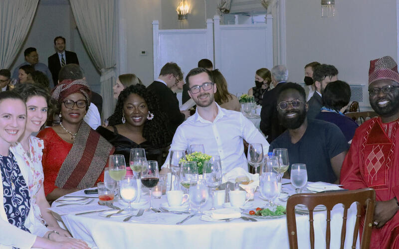 Graduate students around a table