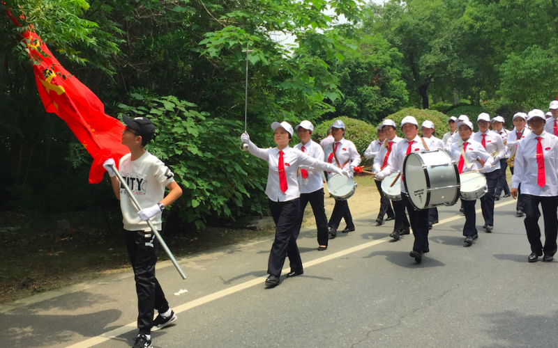 A Catholic marching band approaching Sheshan Basilica