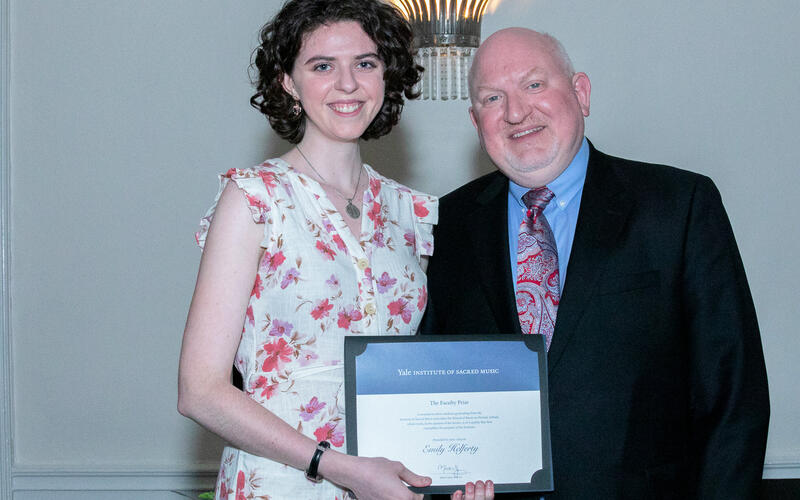 Graduate accepting an award