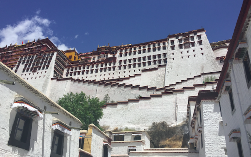 Potala Palace, which houses tombs of past Dalai Lamas and is a major pilgrimage site