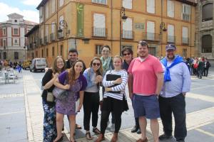 Schola singers and ISM professor Jimmy Taylor in the town square outside León Cathedral