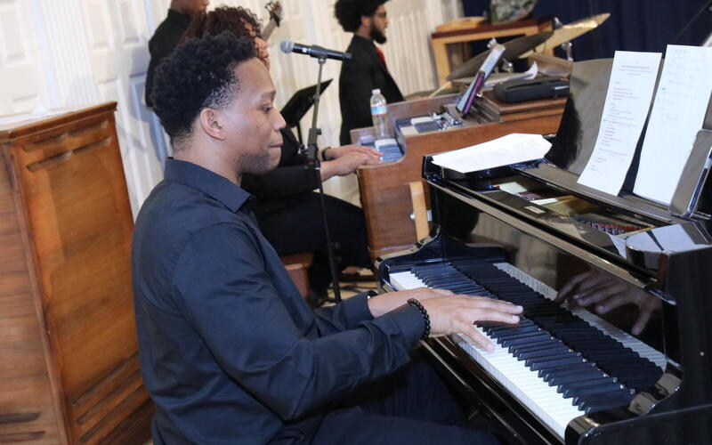 Student playing the piano