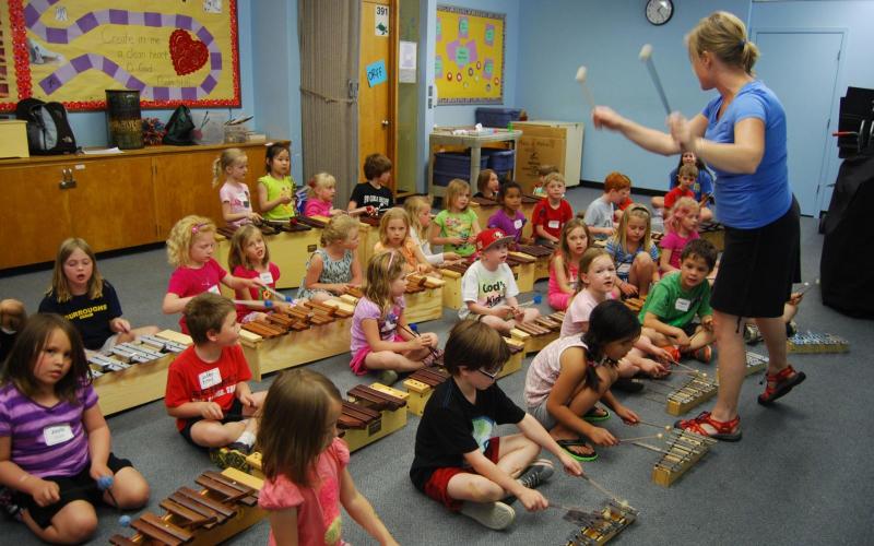 Kindergarten class playing with musical instruments