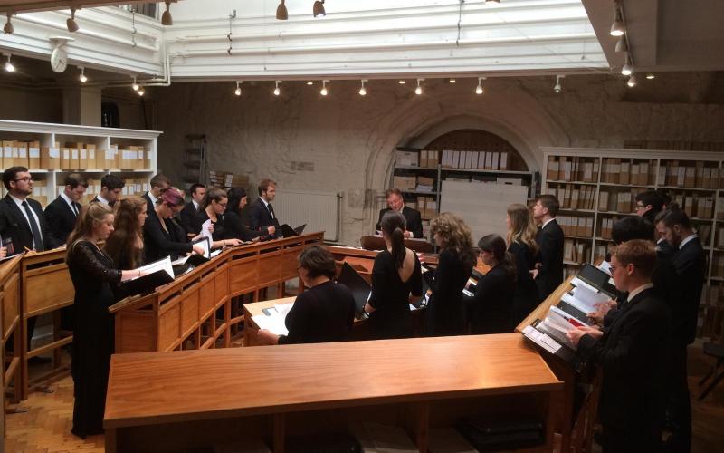 David Hill rehearses Schola in the Song School at Westminster Abbey