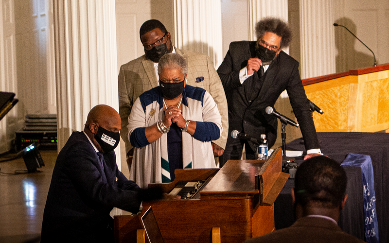 Derrick Jackson plays organ for the captivated panelists