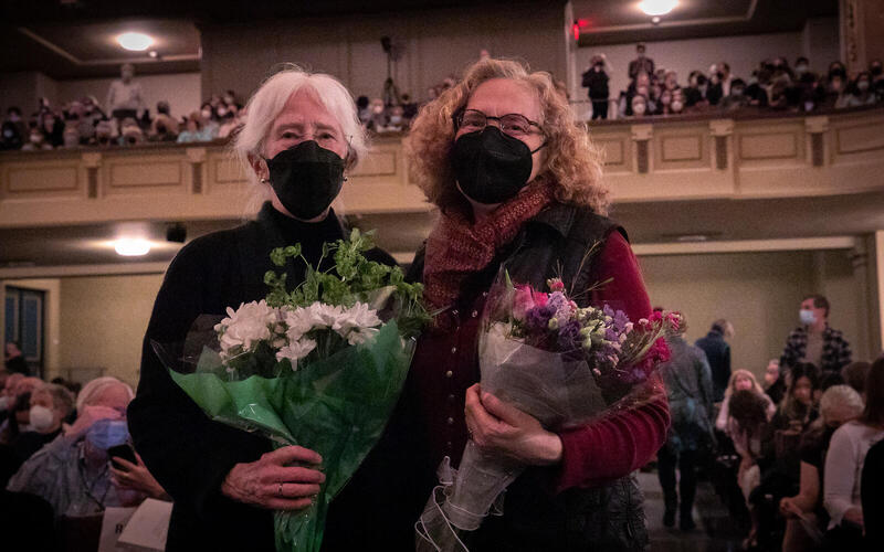 Marguerite L. Brooks and another woman with flowers