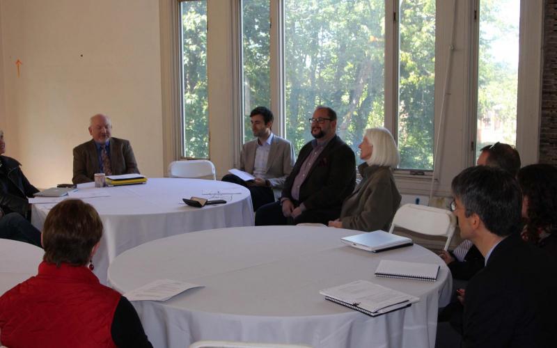 Staff sitting a tables