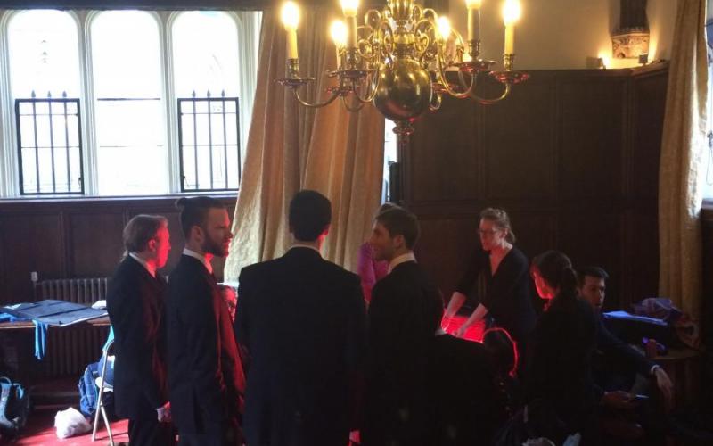 Schola members warm up before their Evensong service at St. John's College, Cambridge