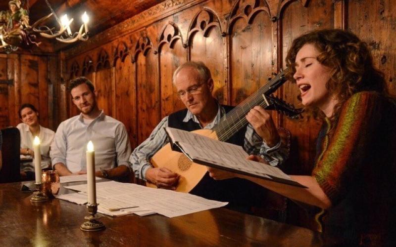 singing and playing the lute