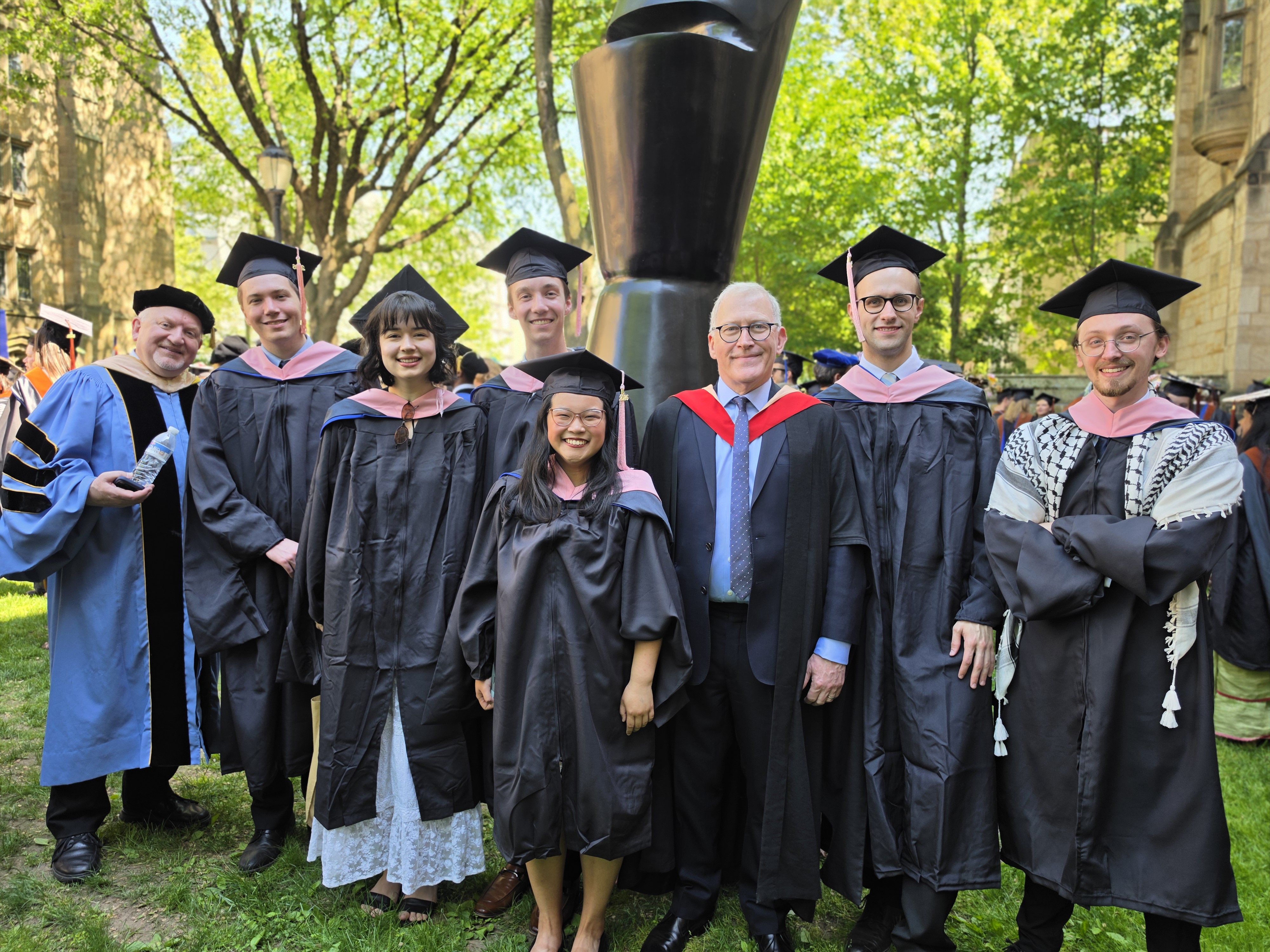 2026 ISM organ studio graduates and faculty in regalia
