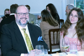 Graduates at table