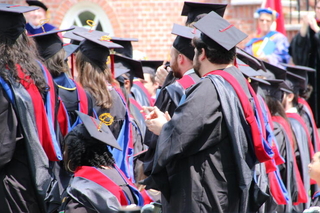 Graduates clapping