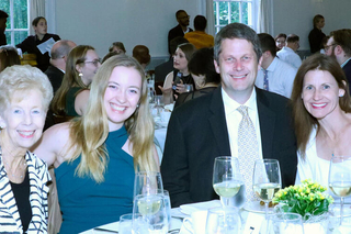 Graduate students around a table