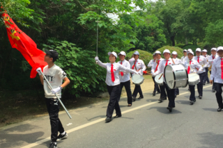 A Catholic marching band approaching Sheshan Basilica