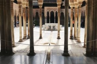 A view of the Alhambra from within the storied “Court of the Lions”