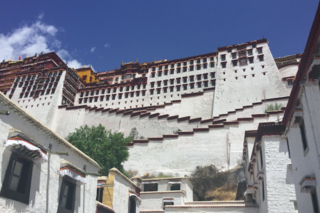 Potala Palace, which houses tombs of past Dalai Lamas and is a major pilgrimage site