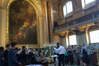 David Hill rehearsing Schola members for their joint Evensong at the Old Royal Naval College, Greenwich