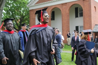 Graduates marching after receiving diplomas