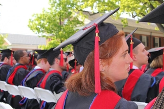 Graduates with caps on