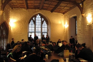 Schola and Juilliard415 members dressed for their Oxford concert in the Old Library of the University Church of St. Mary the Virgin