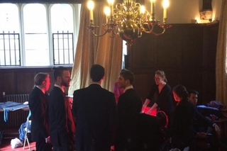 Schola members warm up before their Evensong service at St. John's College, Cambridge