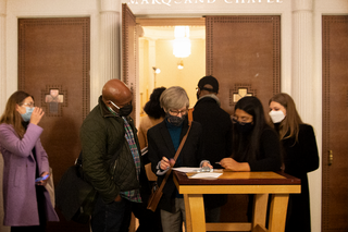 The live crowd checks into Marquand Chapel