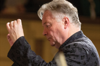 David Hill conducting