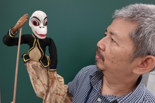 Rod Puppet with a puppeteer