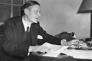 T.S. Eliot at a desk working