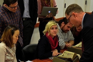 Students learning from Divinity professor