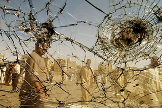 Bullet holes on a windshield