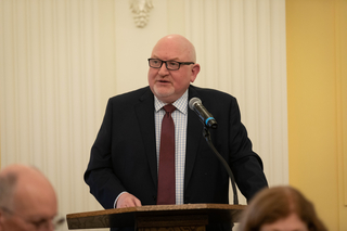 Martin Jean standing at the podium