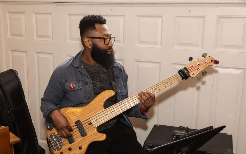 Student performs on electric bass