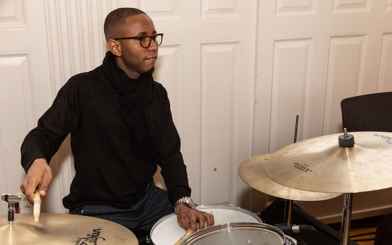 Student performs on drums