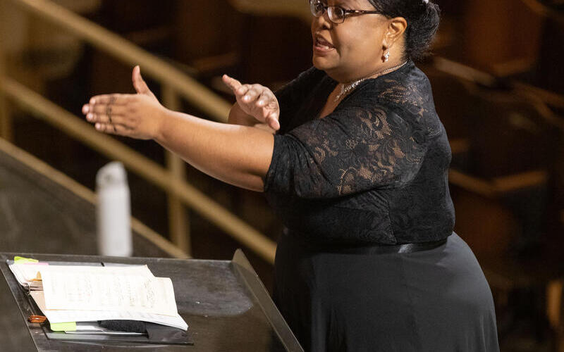 woman conducting