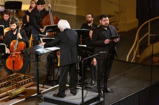 Fredy singing with Yale Schola Cantorum in Woolsey Hall, conducted by Masaaki Suzuki