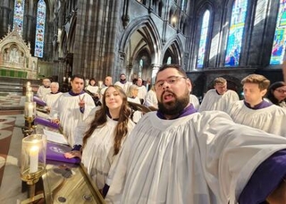 Fredy and fellow choir members canting evensong